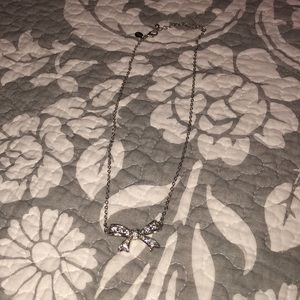 Silver bow necklace
